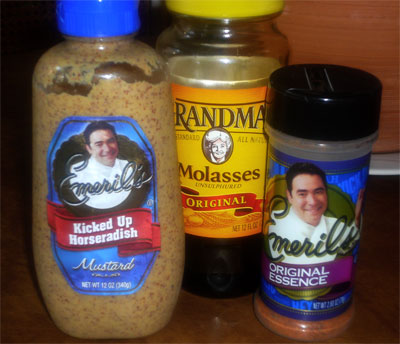 Emeril's smiling face on his products